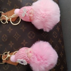 Keychains....Choose 1 with the daisy or the bow $7